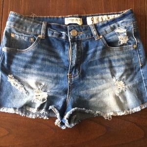Distressed jean shorts
